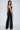 Good behavior pleated bust halter neck jumpsuit