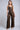 Make an entrance tie die leather bustier en cargo pants set